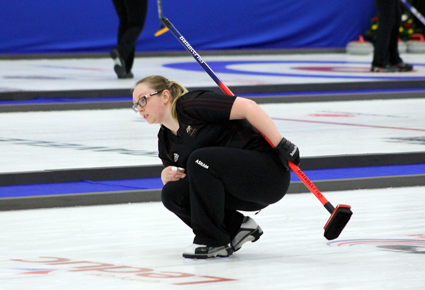 MacEwan Griffins lead Sara Fraser watches a shot against Fanshawe earlier on Tuesday. She curled 83 per cent in the semifinal to pace the Griffins, but they came up just short, 6-5 in an extra end (Jefferson Hagen photo).
