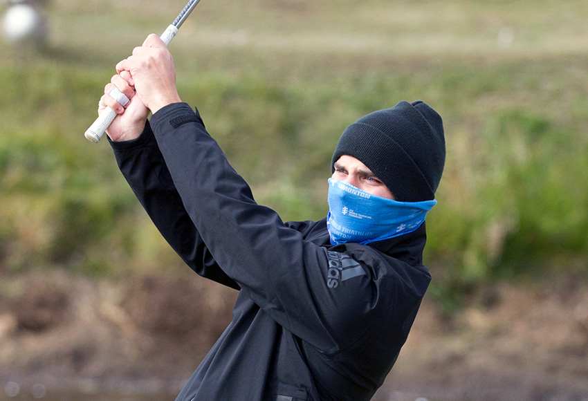 Josh Gorieu was bundled up for last month's cold ACAC Championship at Red Deer's Alberta Springs. The senior and his Griffins teammates will be looking to brush off inclement weather that's hampered their preparations as they aim for the medals this week in Medicine Hat (RDC Athletics photo).
