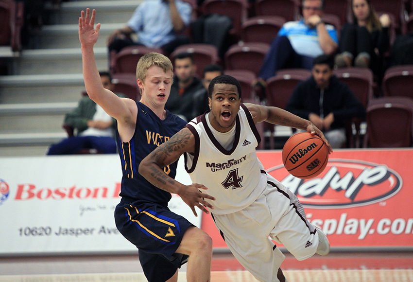 Adonis Monfort-Palomino looks for an opening against Victoria last season. He and his teammates are off to Ontario this week for the Naismith Classic at the University of Waterloo (Robert Antoniuk photo).