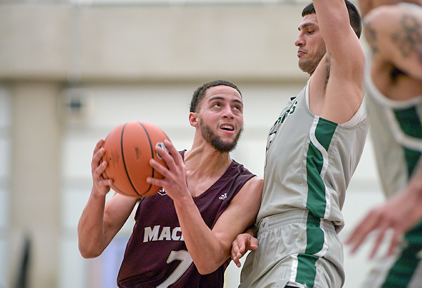 Jake Notice looks for an opening against UFV on Saturday night. He scored a game-high 24 points as the Griffins fell just short of their first win of the season (Chris Piggott photo).