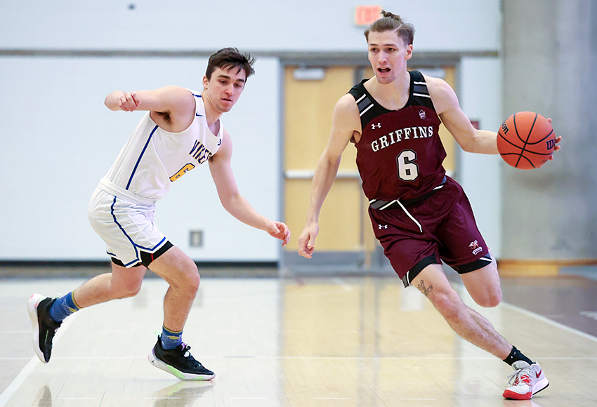 Thai Haak led the Griffins with 13 points and also drew the tough assignment of guarding the reigning Canada West player of the year Diego Maffia, pictured (James Maclennan photo).