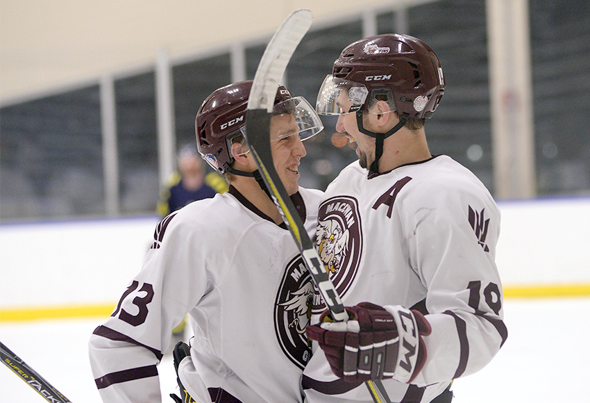Cameron Gotaas, right, celebrates his game-opening goal with teammate Jacob Schofield on Friday night (Len Joudrey photo).