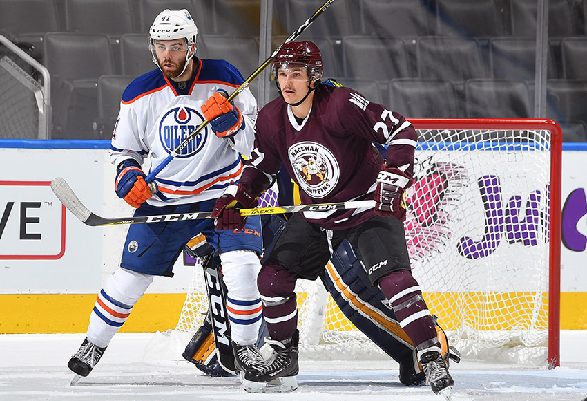 MacEwan's Stefan Danielson battles with Evan Polei during the MacEwan-NAIT All Stars' match against the Edmonton Oilers' rookies last year. The teams will square off again on Sept. 11.