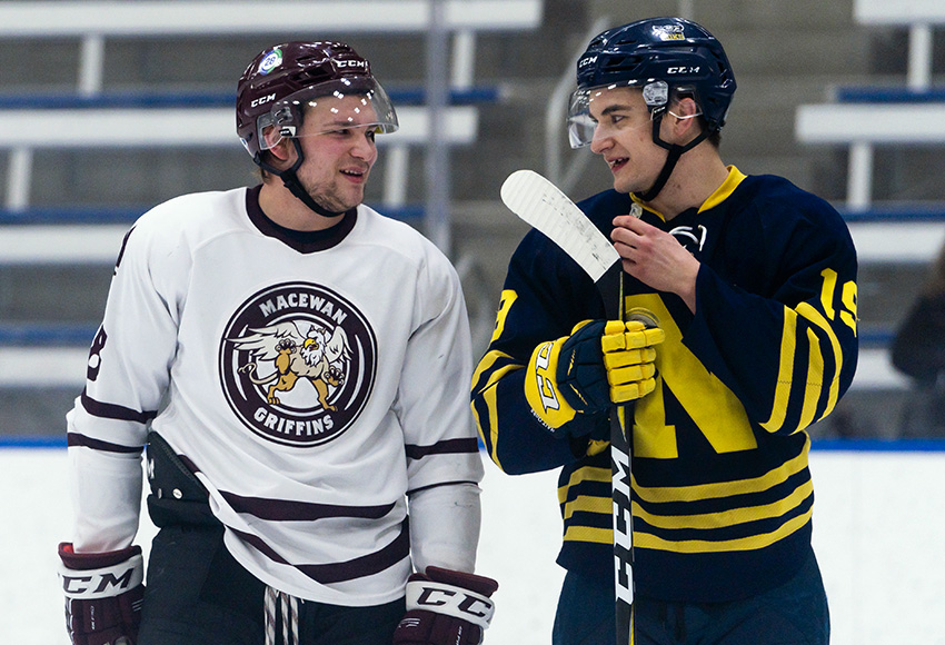 MacEwan's Garan Magnes, left, and NAIT's Tanner Younghans chat while waiting for a faceoff in a March 1 meeting between the teams. The rivals will meet in a best-of-three series for the 2019 ACAC Championship this weekend (Matthew Jacula photo.