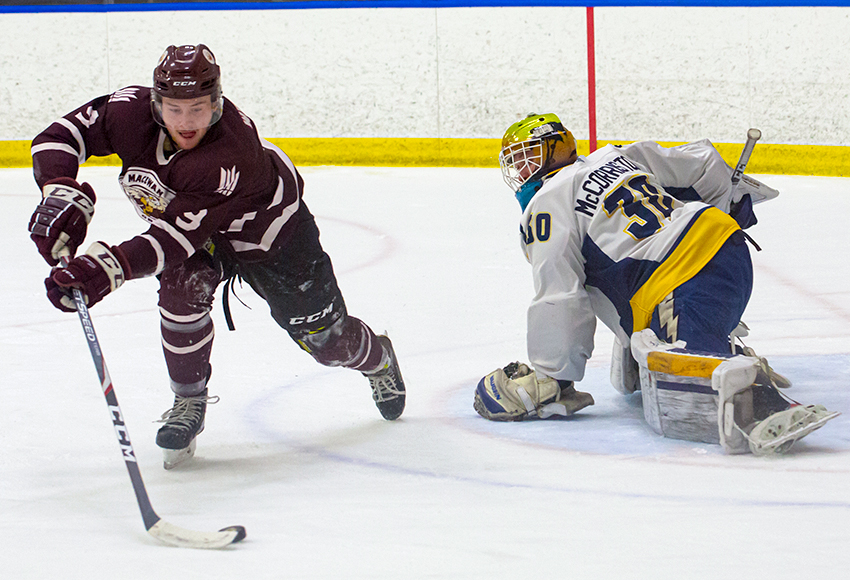Zach Webb tries to corral a puck in front of Concordia goaltender Tanner McCorriston in Game 1 on Friday. The Griffins were unable to beat the Thunder goalie in suffering a 2-0 defeat in Game 2 on Saturday (Jake Bradley photo).