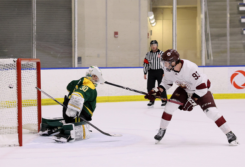Ethan Strang scores MacEwan's seventh of the game on a penalty shot late in the third period (James Maclennan photo).