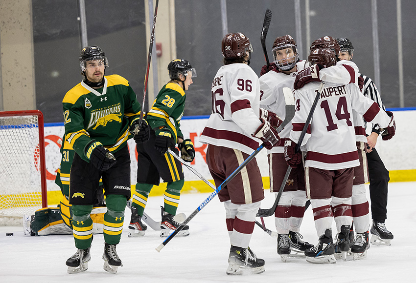 Griffins players celebrate Ethan Strang's goal late in the second period (Rebecca Chelmick photo).