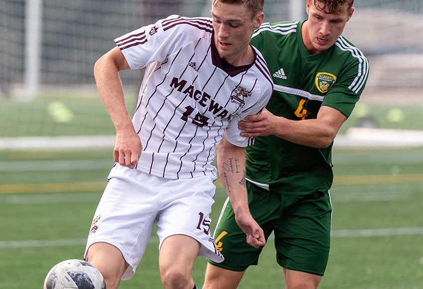 Everett Orgnero, seen battling with Alberta's Noah Cunningham in a match between the teams back in August, scored his eighth goal of the season on Saturday, officially doubling the program's previous record for most goals in a Canada West season (Chris Piggott photo).
