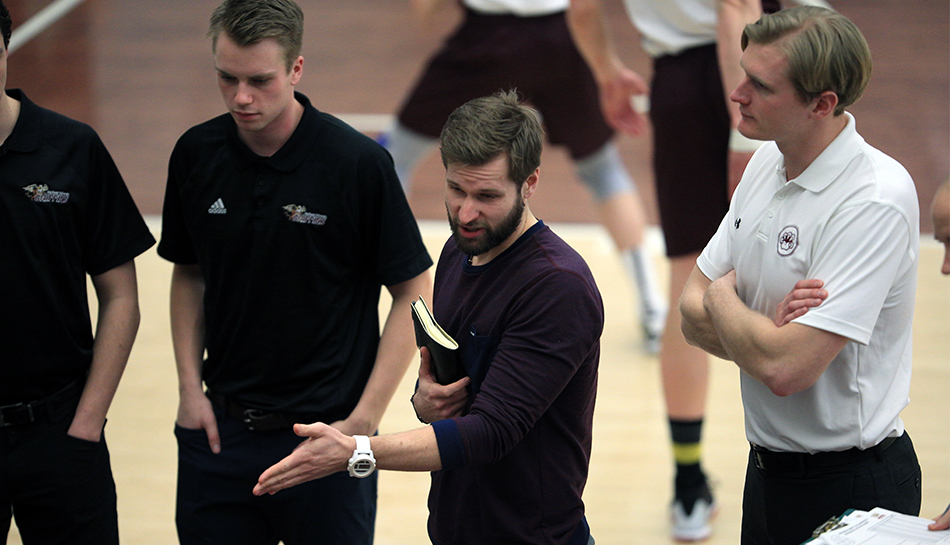 MacEwan men's volleyball head coach Brad Poplawski, centre, seen giving his team some instruction during a match last season, helped guide Team Alberta to a silver medal at the Canada Summer Games in Winnipeg last Saturday (Robert Antoniuk photo).
