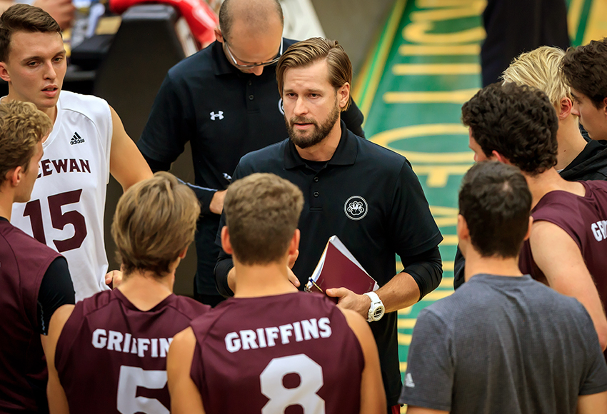 MacEwan head coach Brad Poplawski speaks to his team during a preseason match at Alberta in September. The Griffins nearly upset the Golden Bears, taking them to five sets on Saturday night (Robert Antoniuk photo).