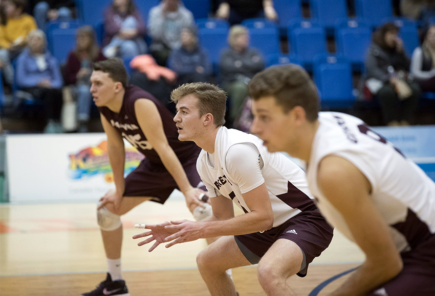 Jordan Peters, centre, waits for a serve against Thompson Rivers University on Friday night. Peters led the Griffins with 14 kills in a 3-1 loss to the WolfPack (Andrew Snucins photo).