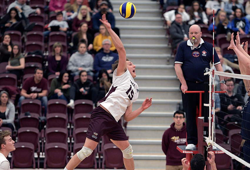 Jordan Krause unleashes a big smash against MRU on Saturday. He led the Griffins with 10 kills in a 3-0 loss (Chris Piggott photo).