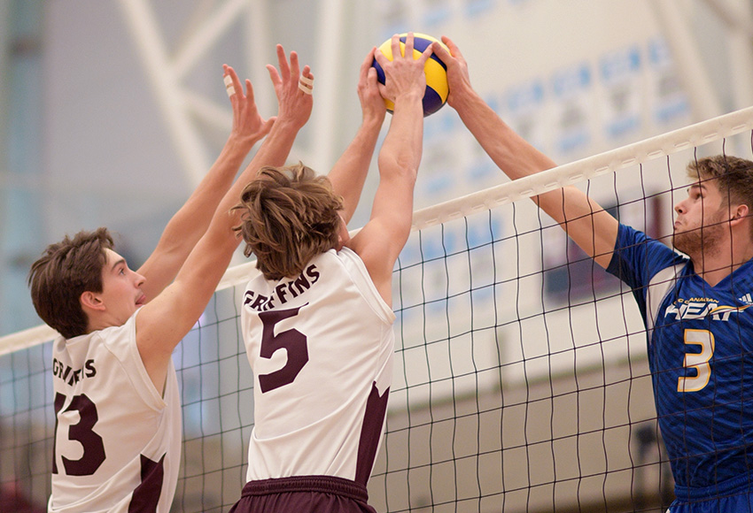 Keenan Koss, left, and Caleb Weiss out-joust UBCO's Max Heppell at the net on Saturday night (Chris Piggott photo).