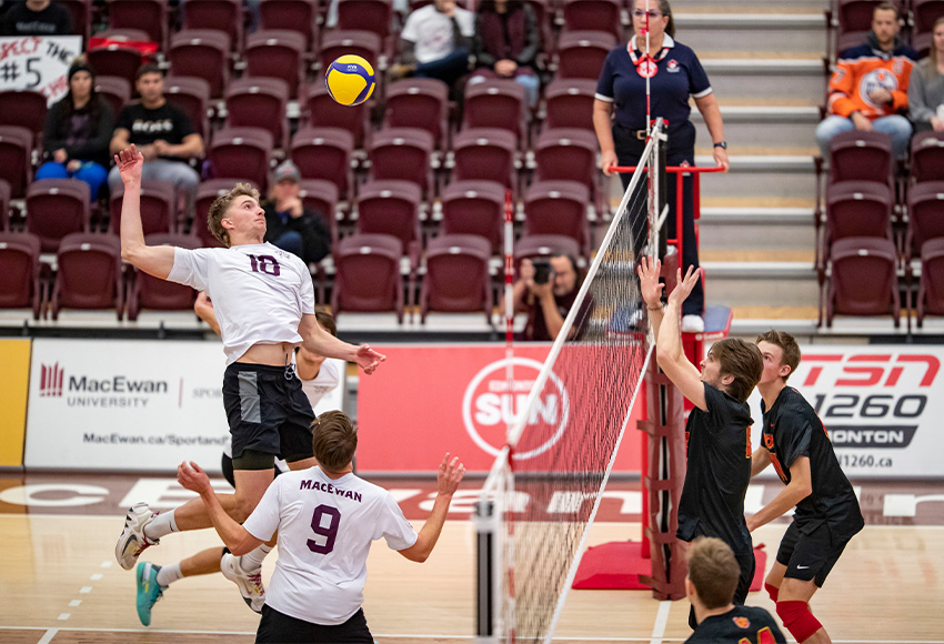 Carsten Bergeon elevates for a kill in the middle against the Calgary Dinos on Saturday (Eduardo Perez photo).