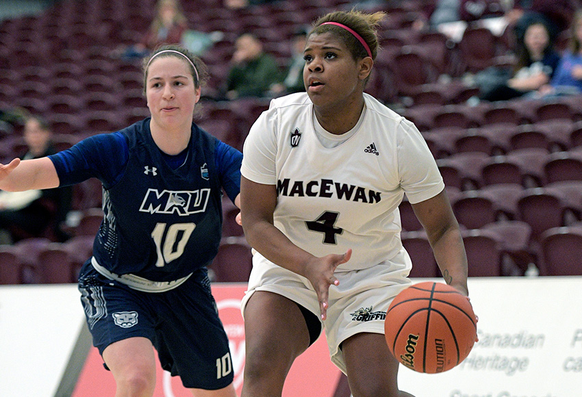 Kristen Monfort-Palomino, right, amazingly earned a starting job with the MacEwan Griffins last season after not playing competitive basketball for more than three years (Chris Piggott photo).