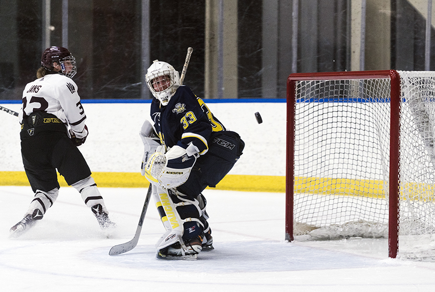 Shyla Jans delivers a shot on a breakaway that eludes NAIT goalie Karlie Fetch before ringing off the crossbar. She later scored on another breakaway, but the Griffins would fall short, losing 3-2 in overtime (Matthew Jacula photo).