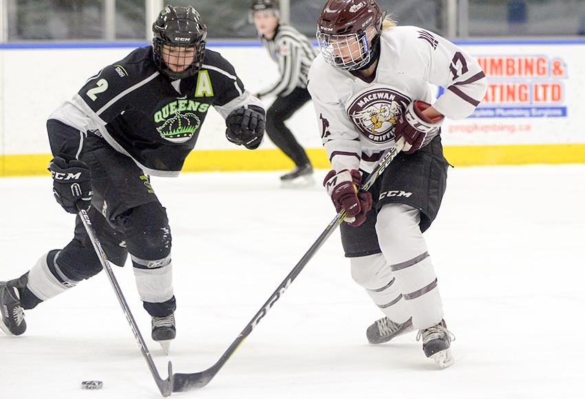 MacEwan's Kennedy Davidson battles Red Deer's Cassidy Anderson during Game 1 of the ACAC final on Thursday in Edmonton. The Griffins were unable to score in Game 2 on Saturday as RDC evened the series with a 4-0 triumph (Len Joudrey photo).