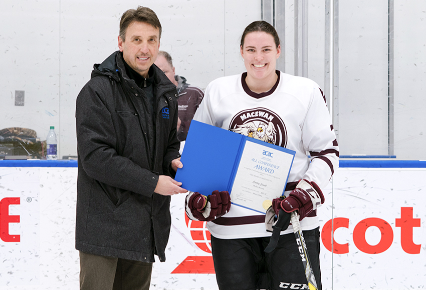 Carley Jewell accepts her All Conference award from ACAC CEO Mark Kosak last Thursday. She was also named the loop's most outstanding player (Matthew Jacula photo).