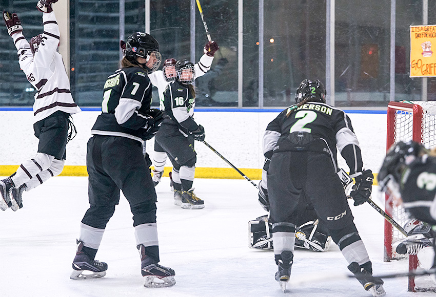 Carley Jewell and Shyla Jans celebrate Jewell's game-winning goal over the Red Deer College Queens in Game 1 last week. MacEwan has scored just two goals on Queens goaltender Tracie Kikuchi in the series, which is tied 1-1 (Matthew Jacula photo).