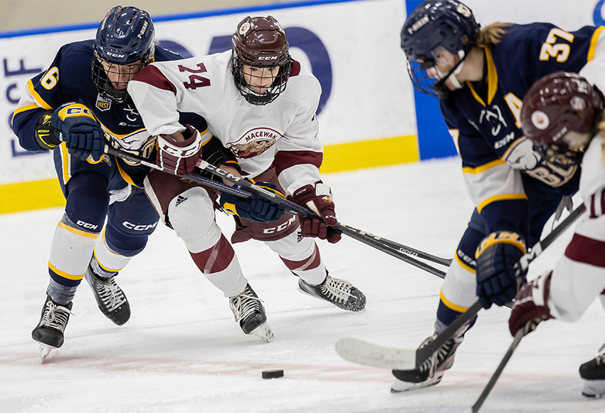 Allee Isley battles for possession against UBC on Saturday (Rebecca Chelmick photo).