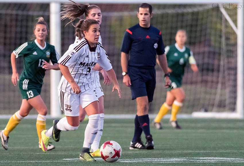 Brittany Costa carries the ball upfield in action against Alberta on Sept. 15. MacEwan won 1-0 after Costa scored the game-winner - her third of the season - in extra time (Chris Piggott photo).