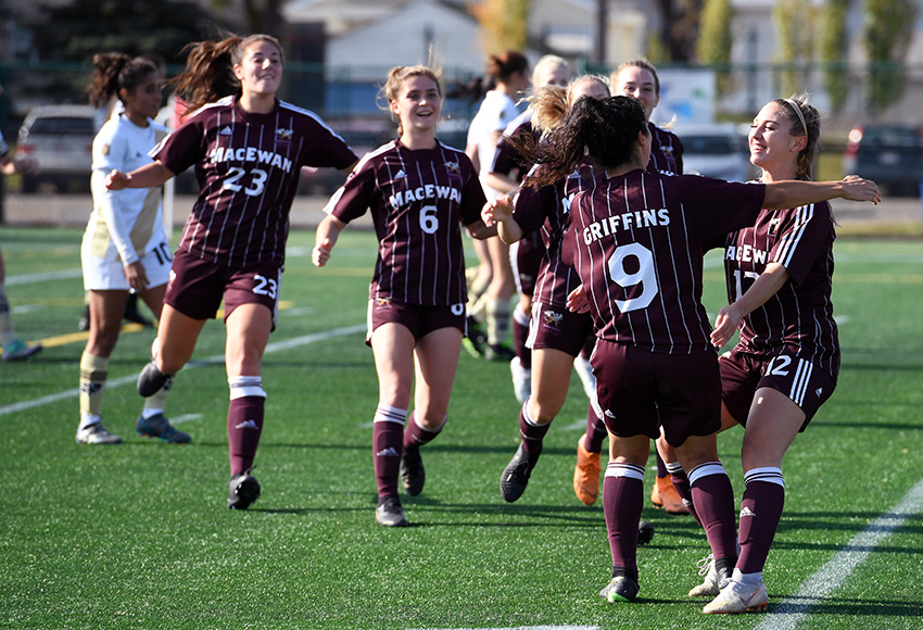 Suekiana Choucair greets a welcoming party of Griffins teammates after opening the scoring on Sunday when her corner kick found the net (Chris Piggott photo).