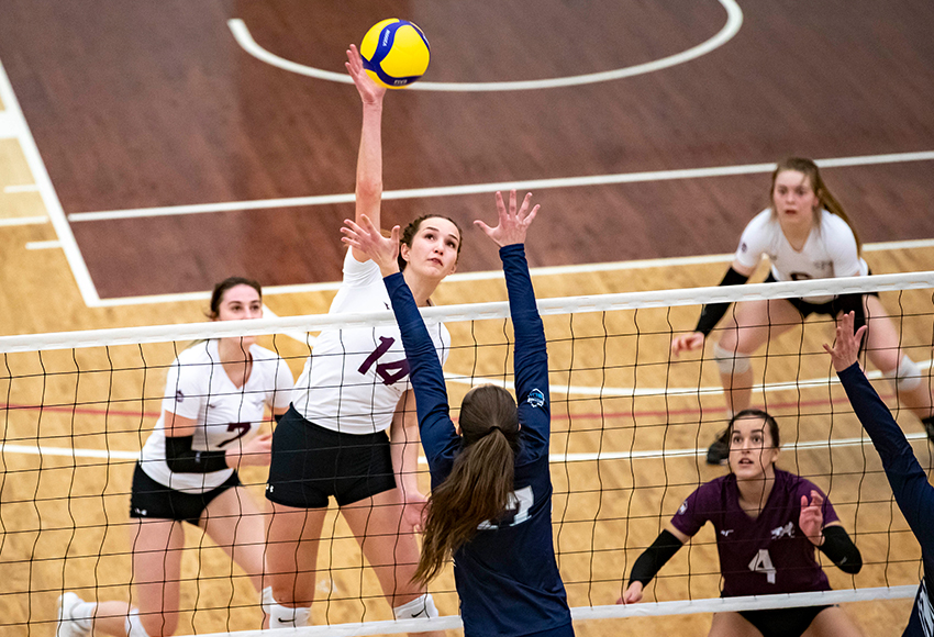 MacEwan's Sarah McGee hits against Mount Royal University earlier this season. McGee co-led the undermanned Griffins with four kills on Friday (Eduardo Perez photo).