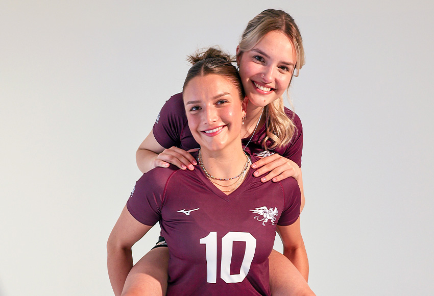 Sisters Danielle (front) and Renee Jodoin are enjoying playing together on the MacEwan Griffins women's volleyball team (Jefferson Hagen photo).