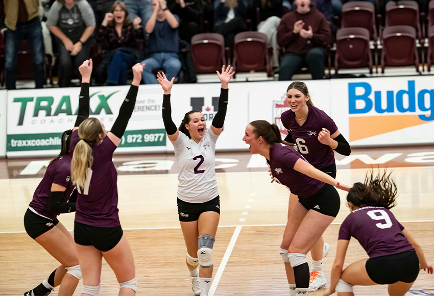 Griffins players celebrate after Sarah McGee's kill put the finishing touches on a straight sets win over UBC Okanagan on Saturday (Eduardo Perez photo).