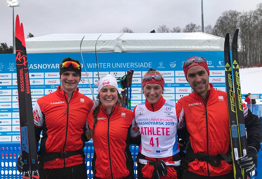 MacEwan indoor track athlete Ember Large (second from right) poses with her Canadian cross-country skiing teammates after the mixed relay at the Winter Universiade in Russia on Friday (FISU photo).
