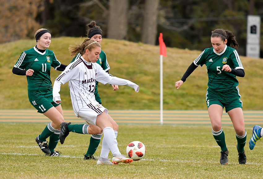 Salma Kamel was a force in both of MacEwan's playoff games over the weekend. She scored against both the University of Alberta, above, on Sunday and against Regina on Friday (Chris Piggott photo).