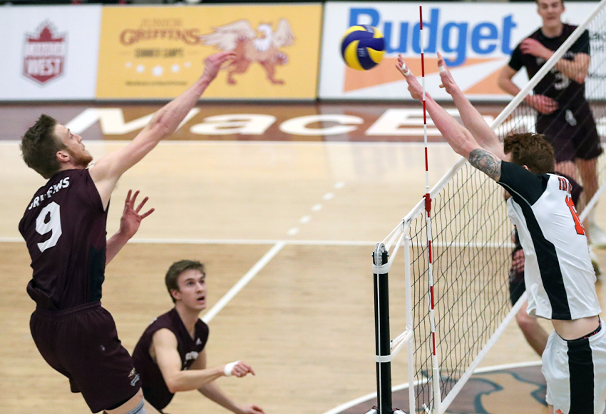 Max Vriend unloads one of his 48 kills against Thompson Rivers University in a two-game weekend series at the David Atkinson Gym, increasing his Canada West-leading total (Eduardo Perez photo).