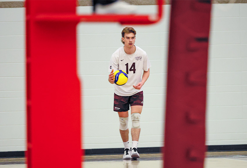 Daylan Andison prepares to serve against Winnipeg earlier this month. The Griffins will conclude a tough first semester with a visit to UBC this weekend (James Maclennan photo).