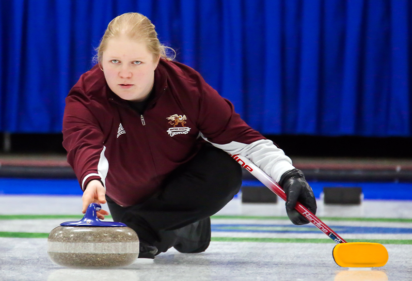 Rebecca Bartz throws a rock during the ACAC Championship in Red Deer. She led the Griffins mixed rink to a title (RDC Athletics photo).