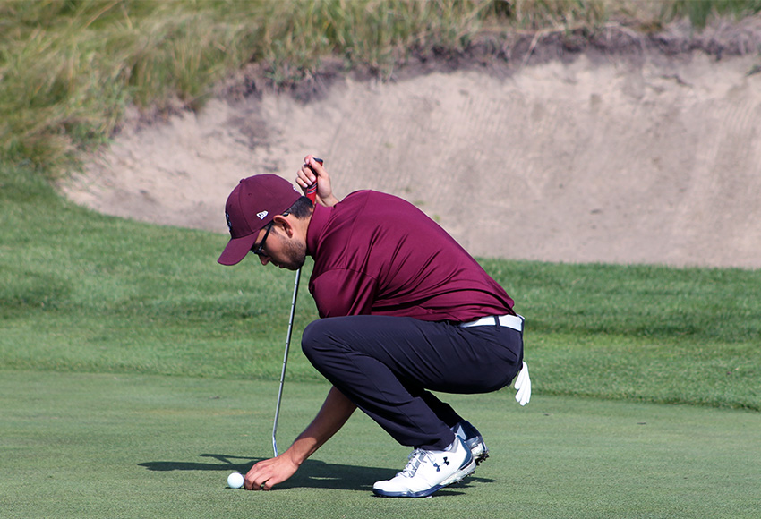 Justin Berget lines up a putt during the ACAC North Regional earlier this month at Red Tail Landing GC. He leads the ACAC Championship by five shots heading into Sunday's final round at Coal Creek Golf Resort (Jefferson Hagen photo).
