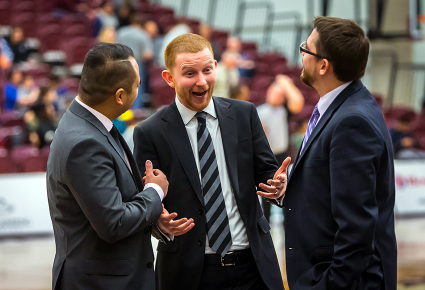 Griffins men's basketball team assistant coach Jackson Parker, centre, served in the same role for Team Alberta's silver medal-winning squad at the Canada Summer Games in Winnipeg last week (Robert Antoniuk photo).