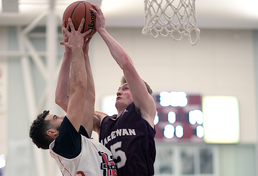 Luke Harold, seen battling for a rebound with a Winnipeg player earlier this season, was one of four Griffins players to score in double digits in a 92-83 loss to Mount Royal University on Saturday (Chris Piggott photo).
