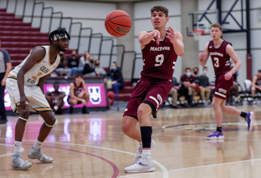 MacEwan's Marco Correas launches a pass as the Griffins move the ball around against the Alberta Golden Bears on Saturday night (Eduardo Perez photo).