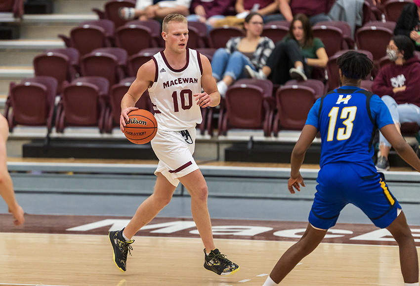 Colton Halbersma looks for an opening against UBC-Okanagan during a preseason game. He is beginning to find his stride at the Canada West level in his second season (Robert Antoniuk photo).