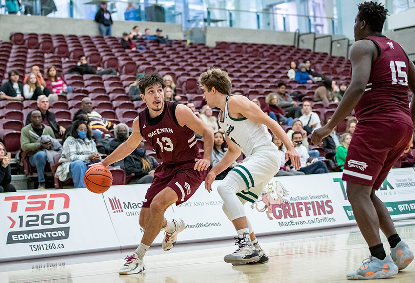 Milan Jaksic drives around a UFV defender on Saturday. He paced the Griffins with a huge 27-point effort (Eduardo Perez photo).