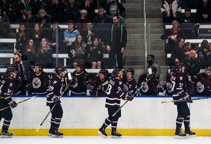 The MacEwan Griffins celebrate a goal during the ACAC final at the Downtown Community Arena last March (Matthew Jacula photo).