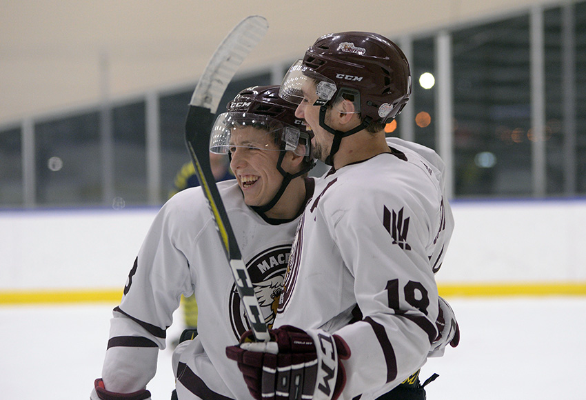 Cam Gotaas, right, seen celebrating a goal with teammate Jacob Schofield against Briercrest last season, completed a natural hat-trick against the Clippers on Friday night (Len Joudrey photo).