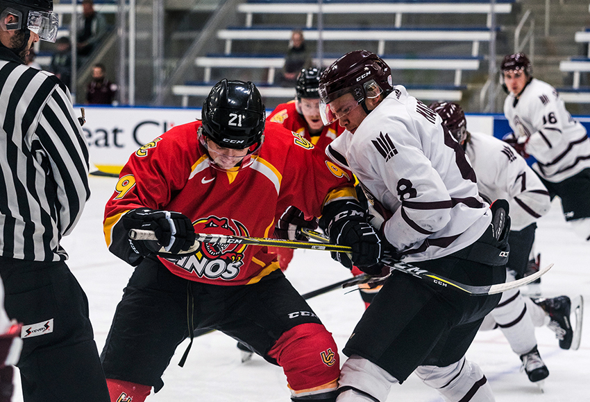 Garan Magnes, seen battling against the University of Calgary during a preseason game, netted a hat-trick in MacEwan's 11-1 win over Briercrest on Saturday (Matthew Jacula photo).