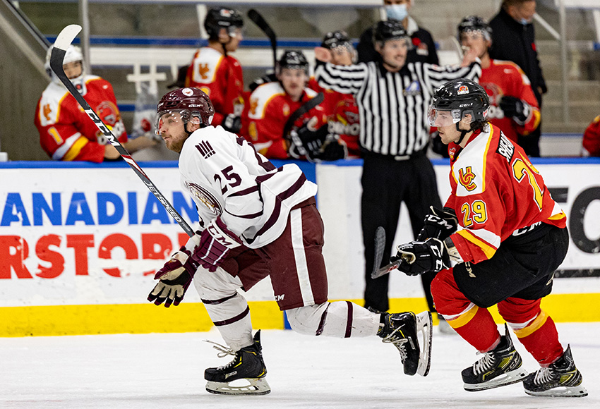 MacEwan's Riley Brandt and Calgary's James Shearer chase down a puck during action on Nov. 5. The teams will meet again on Saturday in Calgary (Joel Kingston photo).