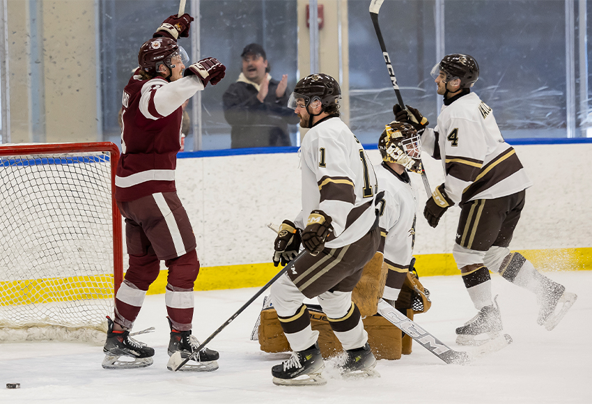 Sam Simard celebrates after tapping in the overtime winner just before the final buzzer (Rebecca Chelmick photo).