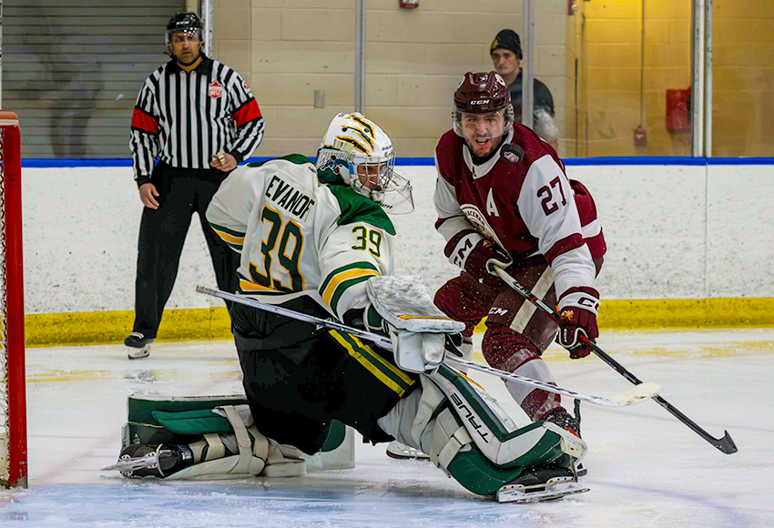 Regina's Adam Evanoff stops Marc Pasemko on the doorstep Saturday night (Derek Harback photo).