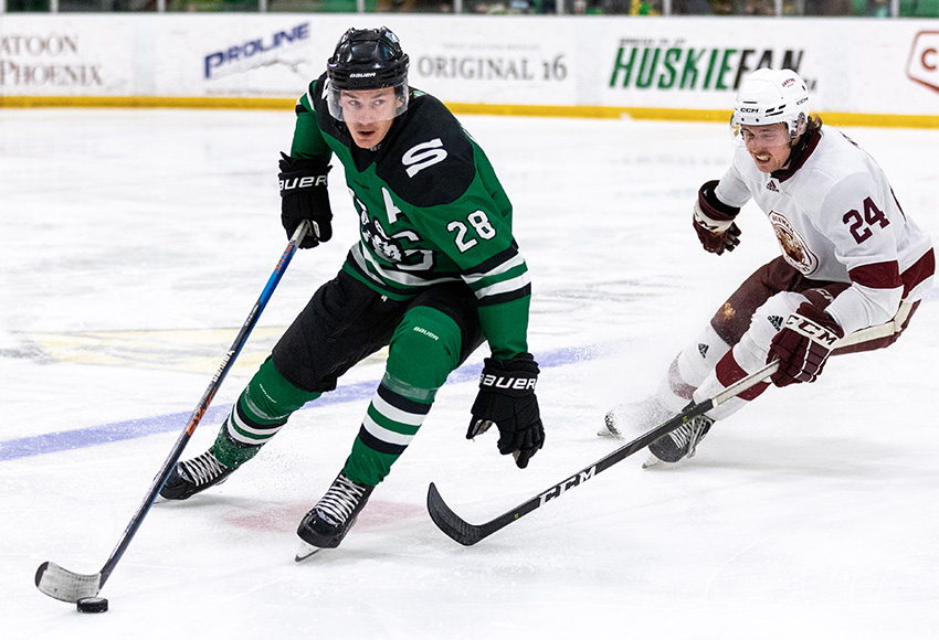 MacEwan's Liam Ryan chases Saskatchewan's Gunner Kinniburgh on Saturday (Rachel Albertson photo).