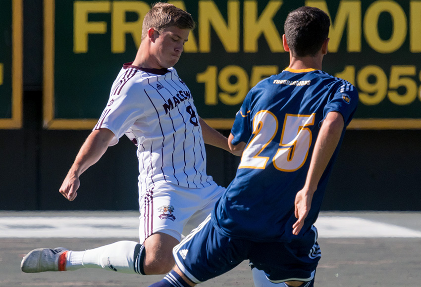 Zach Rochat prepares to launch the ball against UBC in Commonwealth Stadium last month. He continues to bring MVP-level form from the centre back position for the Griffins (Chris Piggott photo).