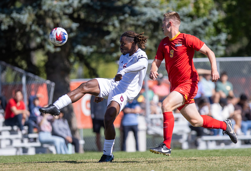 Abass Ajibade makes a play in midfield on Sunday. The Griffins beat the Calgary Dinos 3-1 to get back to .500 in the standings (Chris Lindsey photo).
