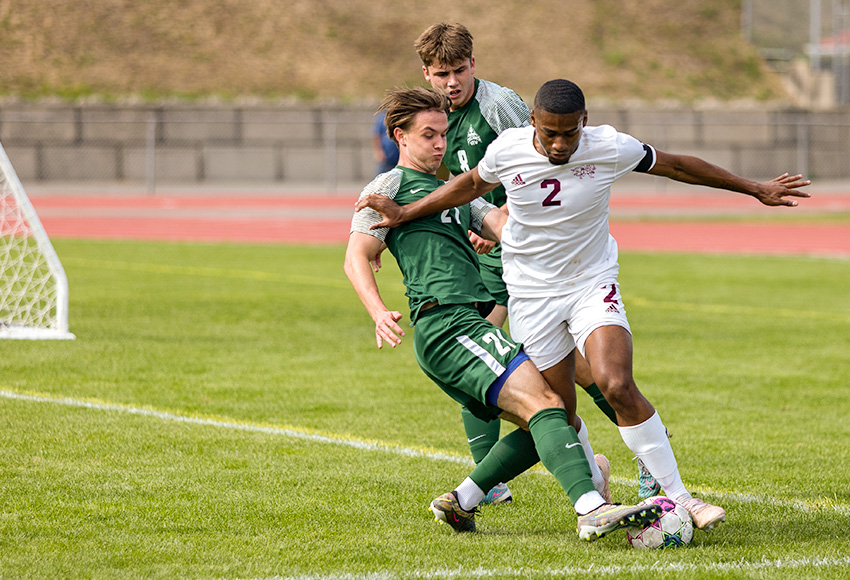 Chance Carter battles for the ball deep in UFV's zone on Sunday (Jordie Arthur photo).